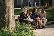 Students sitting outside together