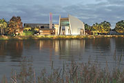 A campus building that overlooks a body of water